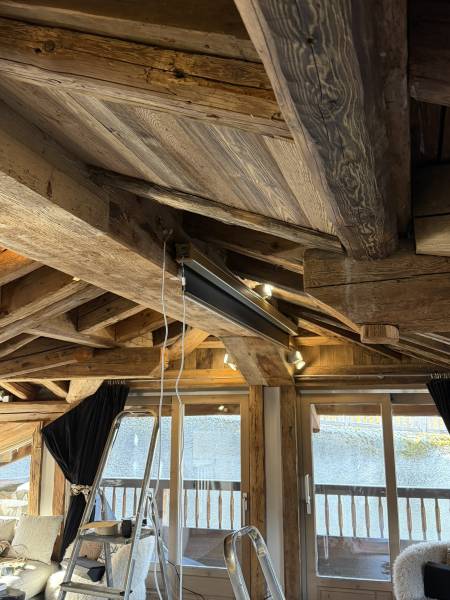 Aménagement pièce à vire salon en home cinema KRIX Courchevel